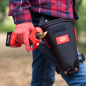 Preview: FELCO 834W elektrische Astschere in der Hand mit Holster